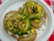 Avocado toast with pine nuts in the market