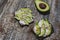 Avocado toast with seeds on wooden vintage background. Slices of avocado on the wholemeal bread with sunflower and flax seeds.