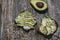 Avocado toast with seeds on wooden vintage background. Slices of avocado on the wholemeal bread with sunflower and flax seeds.