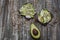 Avocado toast with seeds on wooden vintage background. Slices of avocado on the wholemeal bread with sunflower and flax seeds.