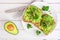 Avocado toasts with pumpkin and chia seeds on whole grain bread, above on white wood