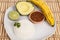 Avocado, white rice, banana and lemon on white background