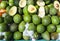 Avocadoes, whole and halved, in French market.