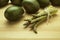 Avocados and asparagus on butcher block