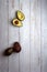 avocados, cut and uncut, on a clear background of deteriorated and white wood