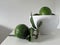 Avocados & Green Leaves in White Bowl on Table