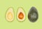 Avocados levitate in air on green pastel background. Concept of vegetable levitation
