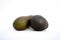 Avocados presented on white background