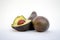 Avocados presented on white background