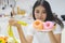 Avoid sweat for good shape. woman looking at sweet donut