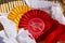 Award rosettes in equestrian sport with red and yellow colors