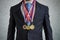 Awarded businessman is wearing many medals