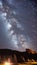 Awe-Inspiring Meteor Shower Streaking Across Starlit Sky
