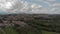 Awesome aerial view of countryside with village amidst meadows and forests