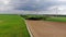 Awesome aerial view over wide country fields - fly over