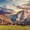 Awesome alpine highlands at sunset. Altaussee village surrounded by Rocky Mountains in Autumn. Colorful sky over the Trisselwand