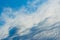 Awesome blue sky with fuzzy white clouds. Image for background