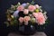 awesome bouquet of pastel flowers in sleek black vase