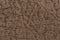 Awesome brown mottled fabric texture close up.