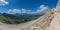 Awesome dolomite panorama and bizarre shaped rocky peak near a hiking trail