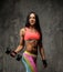 Awesome fitness woman in colorfull sportswear.