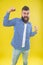 Awesome news. Beard fashion and barber concept. Man bearded hipster stylish beard yellow background. Beard and mustache