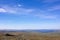 Awesome panorama for a postcard or calendar. Blue cloudy sky and mountain view in the distance. Nature of the Northern