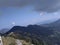 An awesome rare panoramic view of villages and mountains with conifer trees