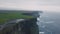 Awesome stones view cliffs of moher taking video with the drone from the air , in the evening.