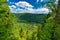 Awesome summer view from a verdant hill in Jacques Cartier National Park, Quebec province, Canada