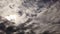 Awesome time lapse of dense cumulus clouds with dramatic light effects