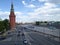 Awesome view from the bridge to the Kremlin, river and busy street