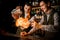 awesome view of smiling bartender man who sets on fire cocktail glass at bar