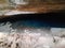 Awesome well with crystal clear blue water inside a cave, Pratina farm, Lencois, Chapada Diamantina, state of Bahia-Brasil/Brazil.