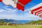 Awning over bright sunny blue sky with bench and sea view