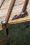 Ax of a battle pair of sharp viking weapons close-ups lie on the edge of the table