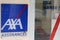 Axa logo brand blue and text sign front of French office multinational insurance agency