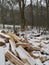 Axe and Firewood Pile in Winters Snow