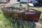 AXMOUTH, DEVON,ENGLAND - JULY 12TH 2020: An old rowing boat called the Mary Poppins filled with flowers stands as a decorative