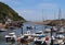 AXMOUTH, DEVON,ENGLAND - JULY 12TH 2020: Yachts and other boats in the marina at Axmouth on a beautiful sunny summers day looking