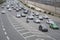 Ayalon Highway traffic with cars. Heavy traffic moves with speed along the highway