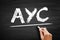 AYC - Advance Your Career acronym, text concept on blackboard