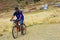 Aymara man riding the bicycle