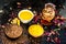 Ayurvedic face pack of chandan,Haldi, and gulab jal or gulab ka pani, with raw turmeric, sandal wood powder and rose petals on woo