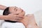 Ayurvedic Head Massage Therapy on facial forehead