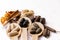 Ayurvedic medicine in wooden spoons with assorted Indian Spices on white background and copy space on top right corner. Ayurveda