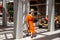 Ayutthaya, Thailand - October, 21, 2016 : Unidentified name buddhist monk walks towards in construction site