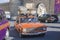 Azerbaijan, Baku-April 10, 2018; An old rusty car of the Fiat Lada model carries old scrap metal on the roof trunk . The driver of