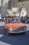 Azerbaijan, Baku-April 10, 2018; An old rusty car of the Fiat Lada model carries old scrap metal on the roof trunk . The driver of