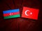 Azerbaijan flag with Turkish flag on a tree stump